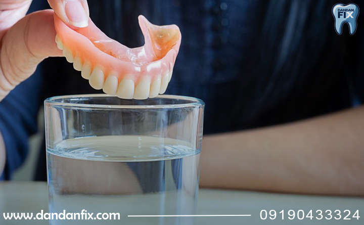 علت گذاشتن دندان مصنوعی در اب